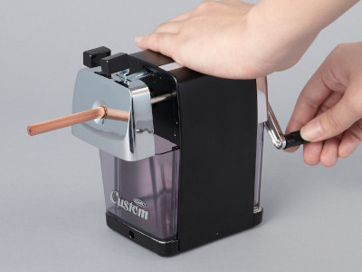sharpening pencil by cranking handle