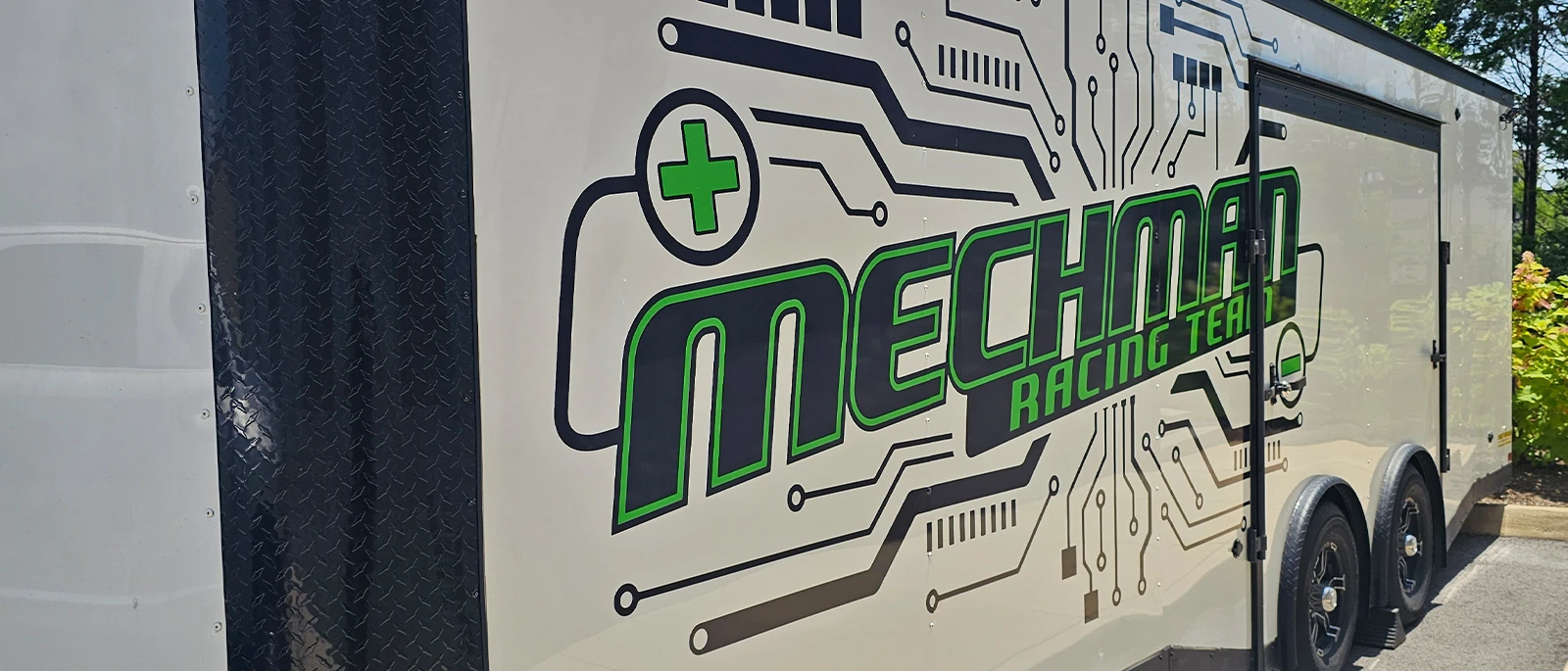System diagram: Mechman 48V secondary alternator on a RAM 6.7L Cummins charging a 48V lithium battery bank in a mobile off-grid power trailer