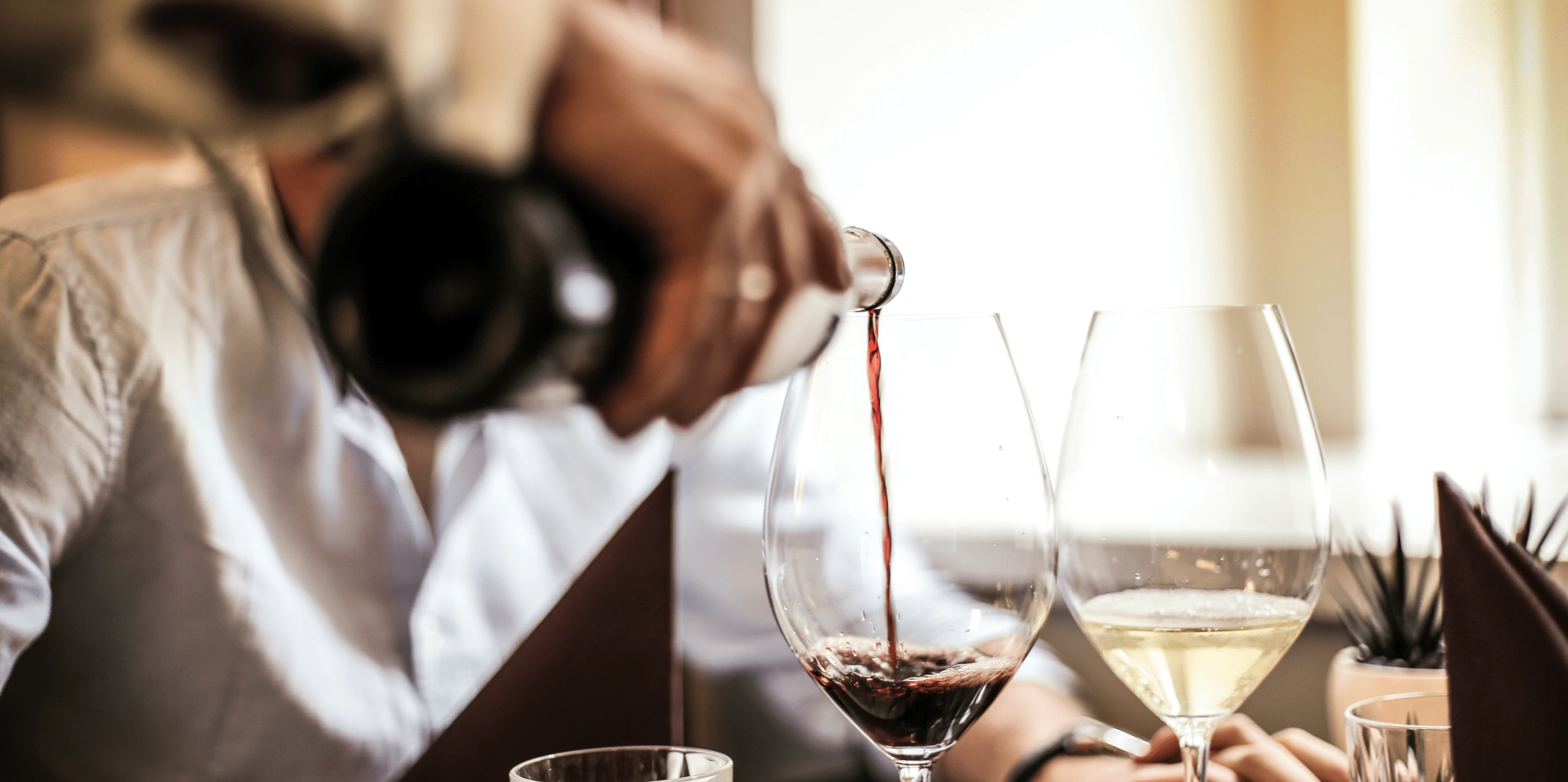 Photo of wine being poured into glass