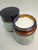 An open amber glass jar showing the thick cream texture of Northland Remedies 1000mg CBD and 1000mg CBG topical lotion.