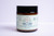 Front view of Northland Remedies 4 oz amber glass jar of 1,000mg CBD and 1,000mg CBG topical lotion.