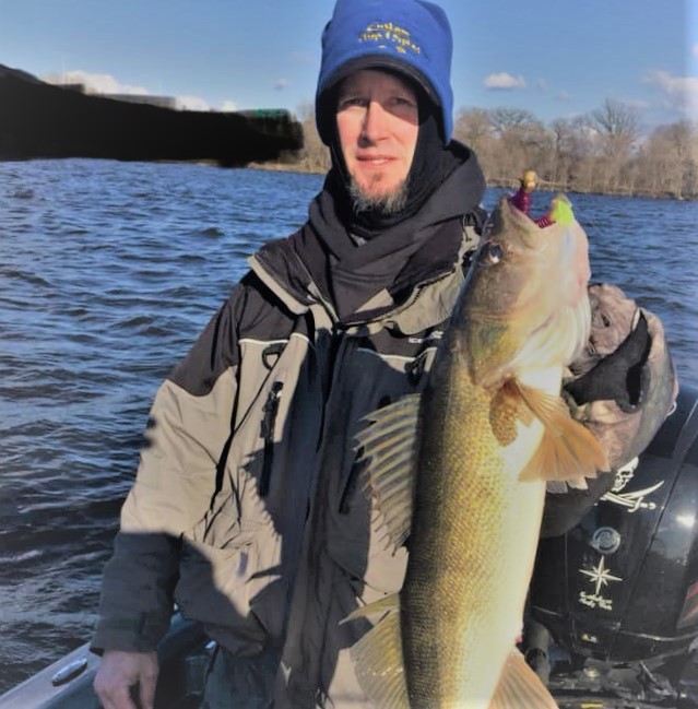 Kevin Merrill with the big pig he caught with an H2O Glitter Jig