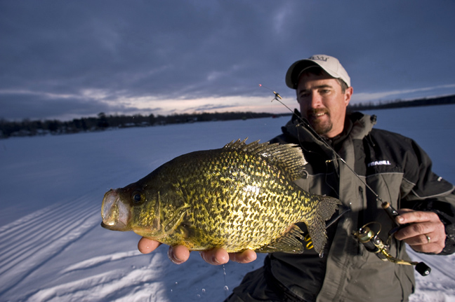 Kevin Fassbind holding a huge bluegill