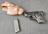 Colt Automatic .25 Auto - Left side w/holster & mag.