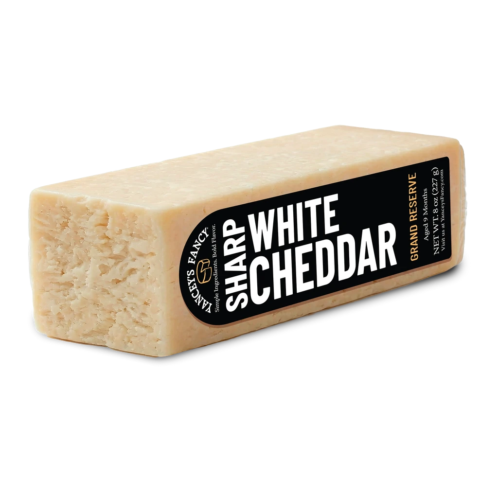 Yancey's Fancy Sharp White Cheddar Cheese 8 ounce stick.