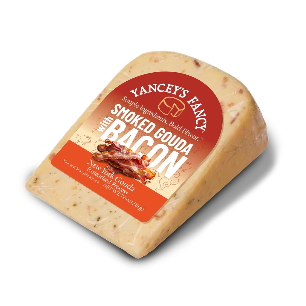 Yancey's Fancy Smoked Gouda with Bacon 7.6 ounce wedge laying flat.