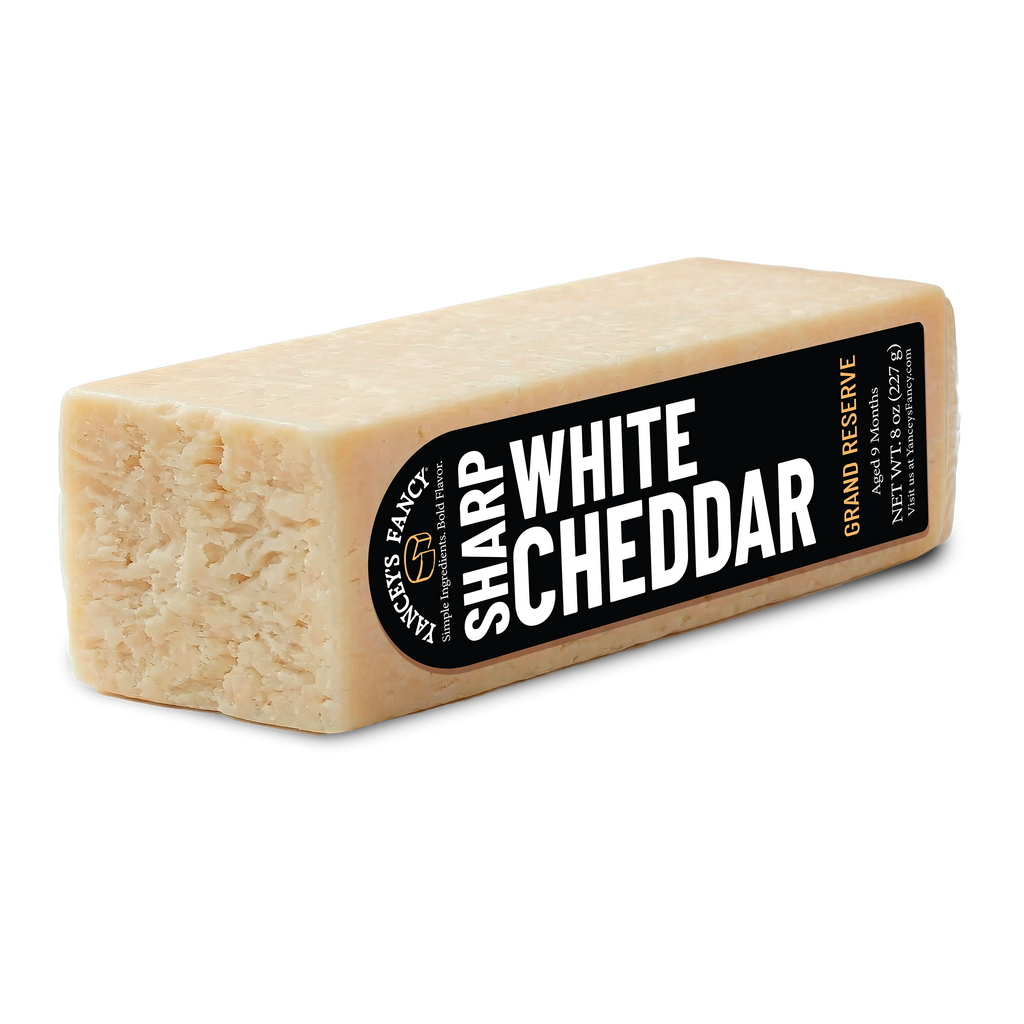 Yancey's Fancy Sharp White Cheddar Cheese 8 ounce stick.