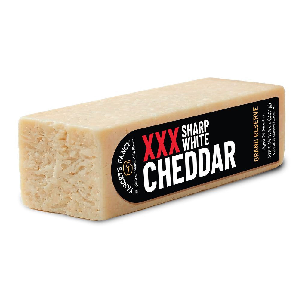 Yancey's Fancy XXX Sharp White Cheddar Cheese 8 ounce wedge.