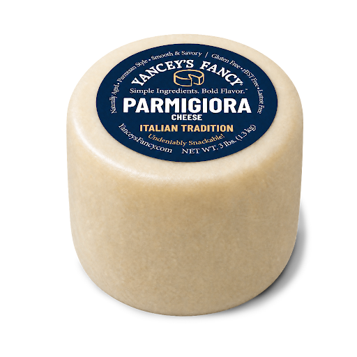 Yancey's Fancy snackable parmigiora 3 pound wheel with label.