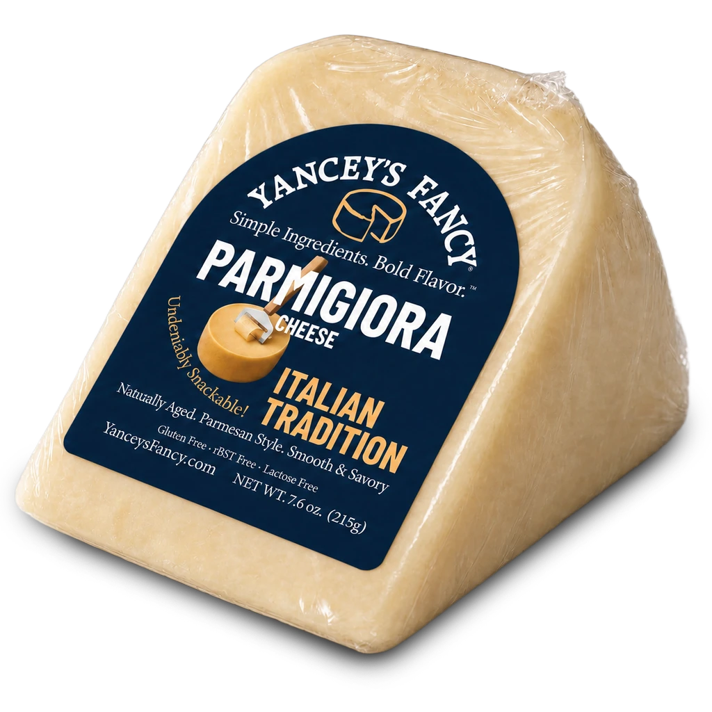 Yancey's Fancy snackable, meltable Parmigiora 7.6 ounce wedge with label.