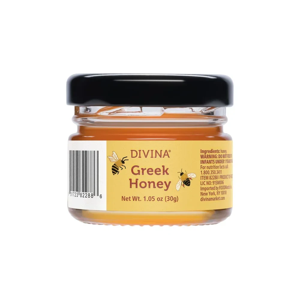 Mini jar of Divina Greek honey, the sweet pairing included in the Grand Crate gift box.