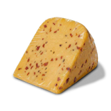 Unpackaged wedge of Yancey's Fancy Natural Ghost Pepper Cheese.