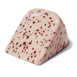Unpackaged wedge of Yancey’s Fancy Strawberry Chardonnay Cheddar Cheese.