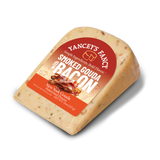 Yancey's Fancy Smoked Gouda with Bacon 7.6 ounce wedge laying flat.