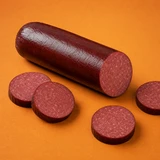 A 12-ounce log of Yancey's Fancy Beef & Garlic Summer Sausage sliced with playful orange background.
