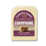Yancey's Fancy Champagne Cheddar 7.6 ounce wedge in packaging.
