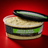 Yancey's Fancy Hatch Chili Cheese Spread dip with an opened container.