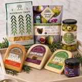 Product detail image of the Cheese Lover gift box with Yancey's Fancy smoked gouda, champagne cheddar, and roasted garlic cheddar, Divina pitted Castelvetrano olives and fig spread, rosemary crisps, and dried figs.