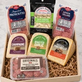Ultimate Feast gift box styled with truffle salami medallions, Yancey's Fancy artisan cheeses, and gourmet charcuterie — the brand's largest shareable spread.
