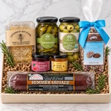 Grand Crate gift box featuring Uncommon Bees raw New York honeycomb, Divina cornichons and Castelvetrano olives, Vermont Nut Free chocolate nonpareils, Divina sour cherry spread and Greek honey, and a Beef & Garlic summer sausage.