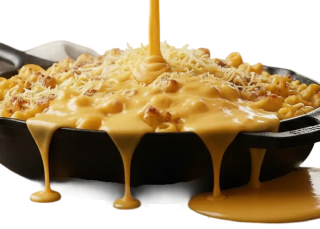 Creamy gourmet mac and cheese made with Yancey's Fancy artisan cheddar blocks