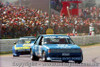 84877 - A. Grant / C. Harris - Ford Falcon XD -  Bathurst 1984 - Photographer Lance Ruting