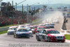 98701 - The Start - Bathurst 1998 - C. Lowndes  Commodore VT leads the field into the first corner.