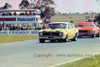 72267 - Ian (Pete) Geoghegan, Super Falcon & Bob Jane, Monaro with the Motorcraft Bus in the background - Calder 1972 - Photographer Peter D'Abbs