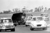 68237 - Geoff Spence looses control behind Wayne Rogerson, Anglia & John Millard & Norm Blunt, Morris Cooper S  - Oran Park 22nd Septmber 1969 - Photographer David Blanch