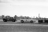 64140 - Ian McDonald / Sid Fisher, Peugeot 404 & Bob Jane  / George Reynolds, Lotus Cortina &  Paddy Hopkirk John Fitzpatrick, Morris Cooper S - Sandown 6 Hour International  29th November 1964  - Photographer  Peter D'Abbs