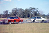 701049 - Fred Gibson, XW GT-HO Falcon & Peter Brock, Holden Monaro GTS 350 - Oran Park 1970 - Photographer Jeff Nield