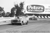 64016 - F. Sutherland / A. Mottram Studebaker Lark  - in the background the  Lex Davison  Ford Galaxie - Sandown 6 Hour International  29th November 1964