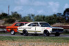 70263 - C. Bond / T. Roberts  Holden Monaro GTS 350 & Fred Gibson Ford Falcon XY GTHO - Surfers Paradise 8th February 1970 - Photographer Jeff Nield