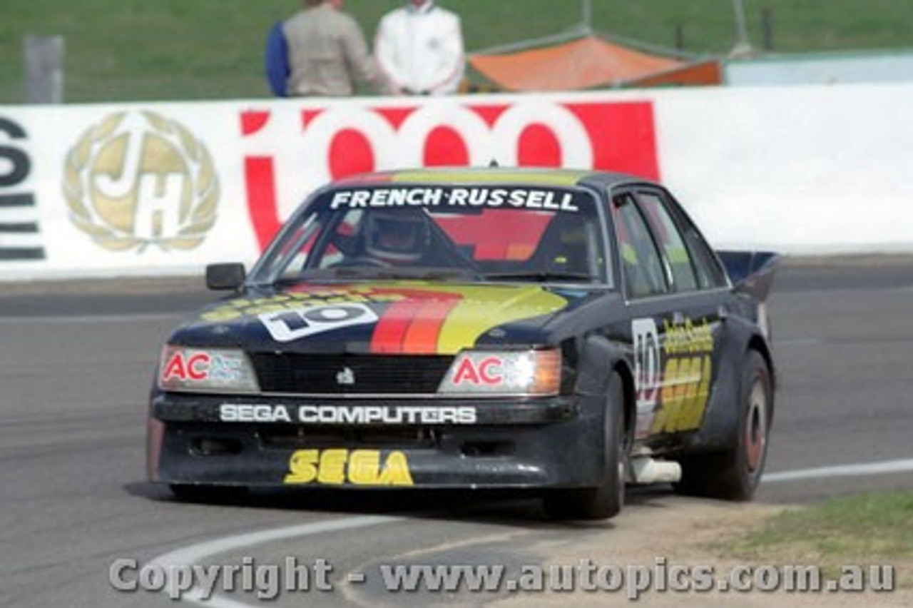 84841 - Rusty French / G. Russell  Holden Commodore VH -  Bathurst 1984 - Photographer Lance Ruting