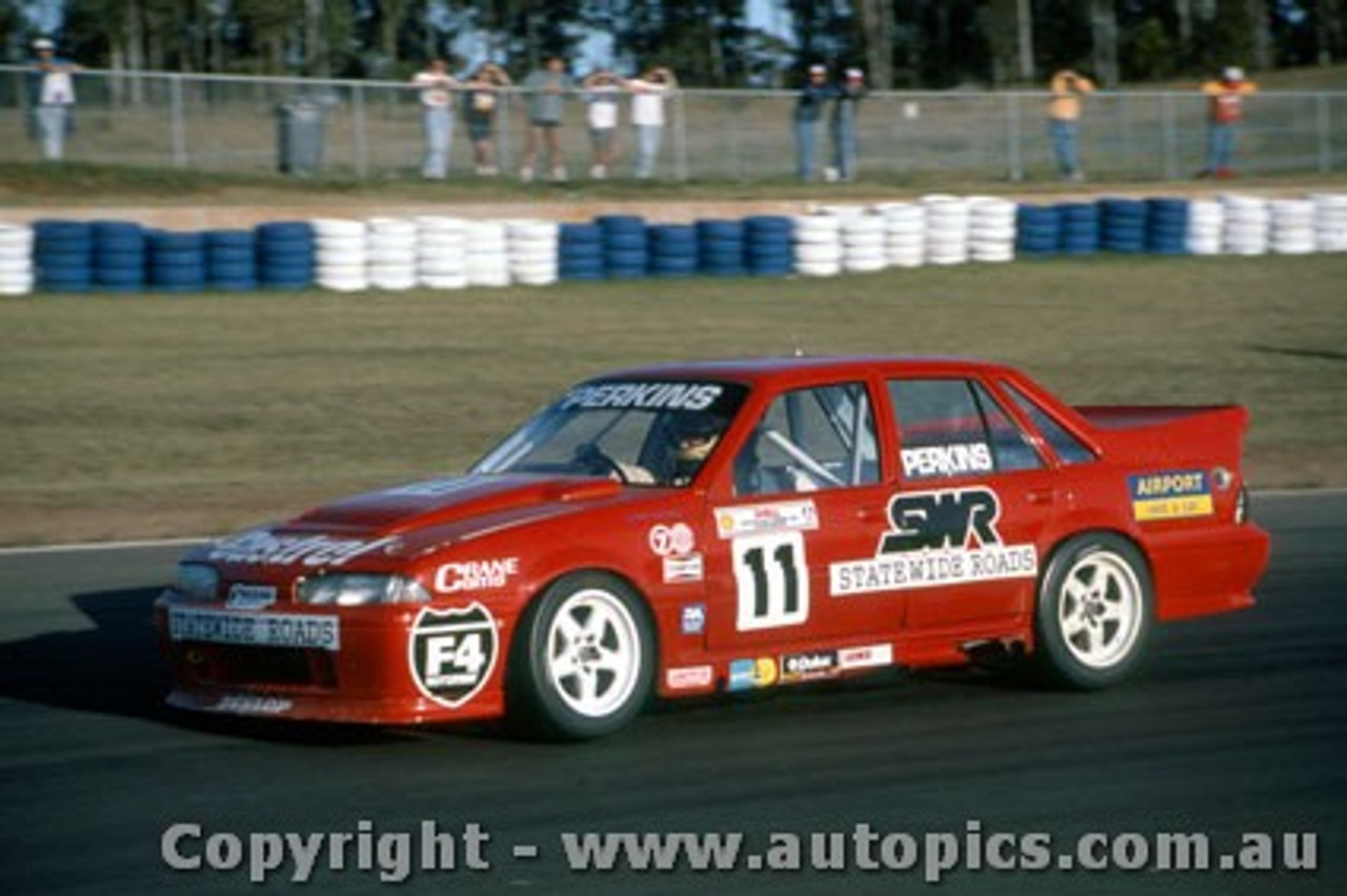 92034 - Larry Perkins  Holden Commodore VP - Eastern Creek 1992 - Photographer Ray Simpson