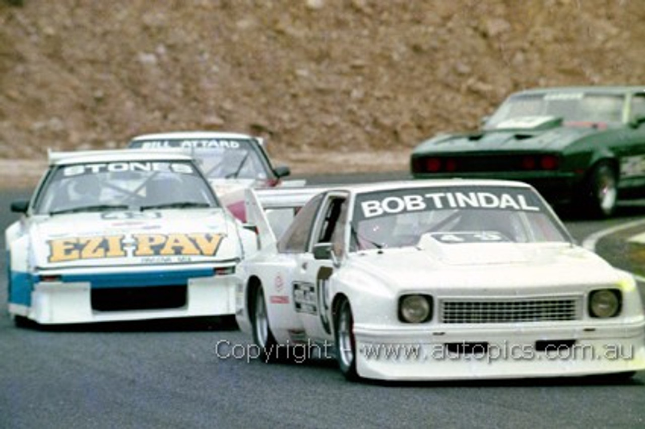 85050 - Bob Tindal, Torana & Ian Stones, Mazda RX7 - Amaroo 7th July 1985 - Photographer Lance J Ruting