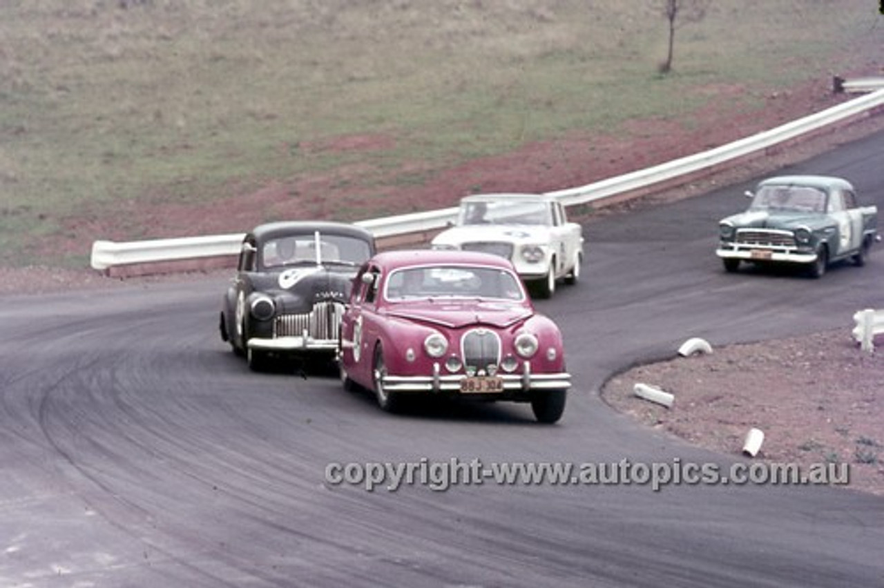 63027 - Bill Burns, Jaguar & John Rootes, Holden FX - Oran Park 1963 - Anne Blackwood Collection