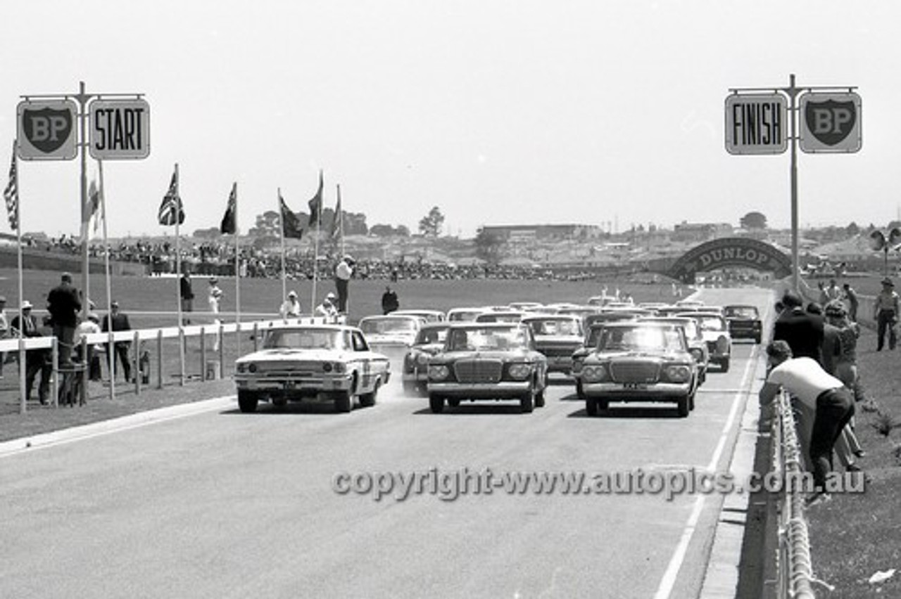 64114 -  Start of the Sandown 6 Hour International  29th November 1964 -  Studebaker Lark's & Galaxie on the front row -  Photographer  Peter D'Abbs