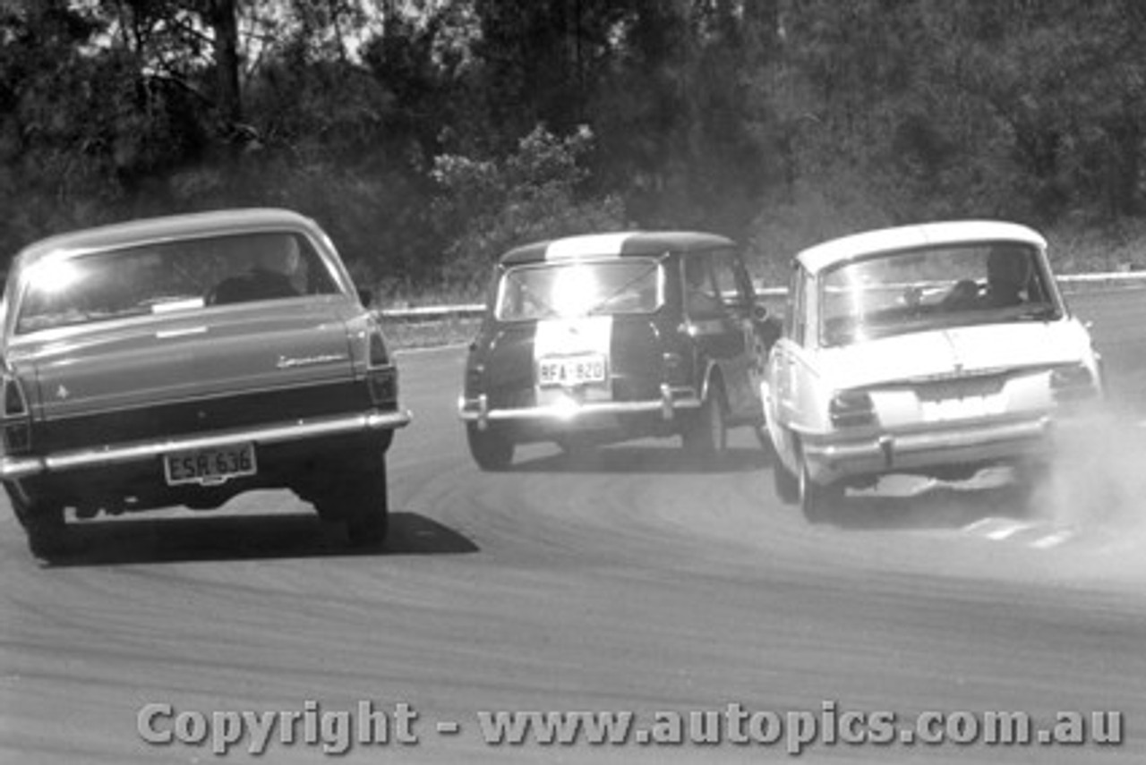 HR Holden,  Isuzu Bellett & a Morris Cooper S having a great dice   -  Warwick Farm 1968