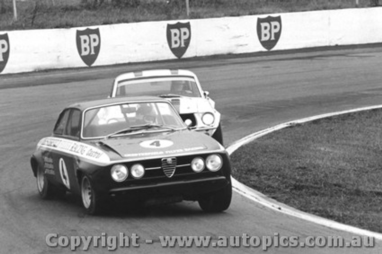 71031 - Foley s Alfa Romeo GTAM  leads Geoghegan s Mustang Oran Park 1971