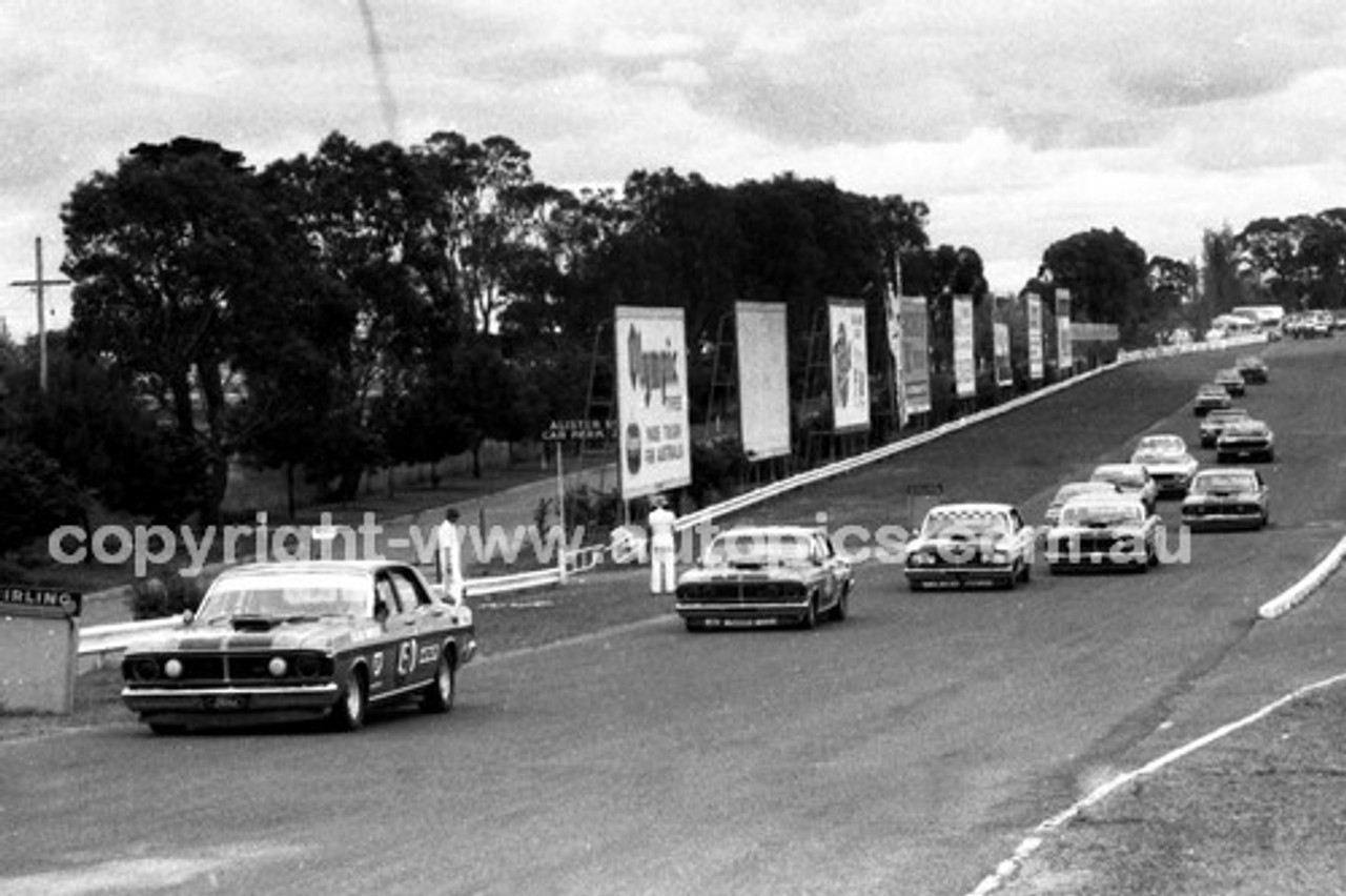 72578 - Allan Moffat, Ford Falcon XY GTHO Leads the pack into Peters Corner  - Sandown 1972 - Photographer Peter D'Abbs