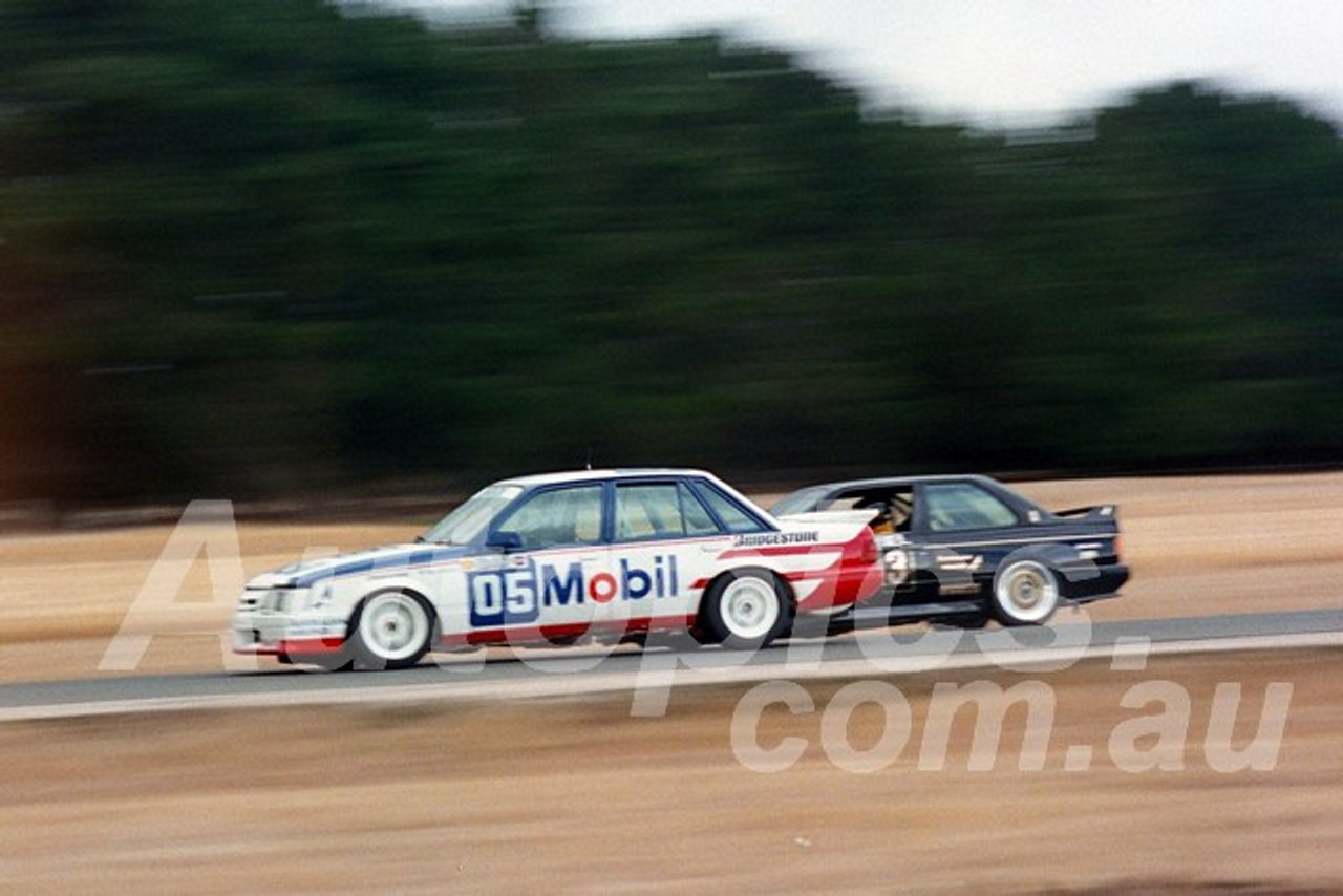 87129 - Peter Brock, VK Commodore & Jim Richards, BMW E30 M3 -  Symmons Plains, 8th March 1987 - Photographer Keith Midgley