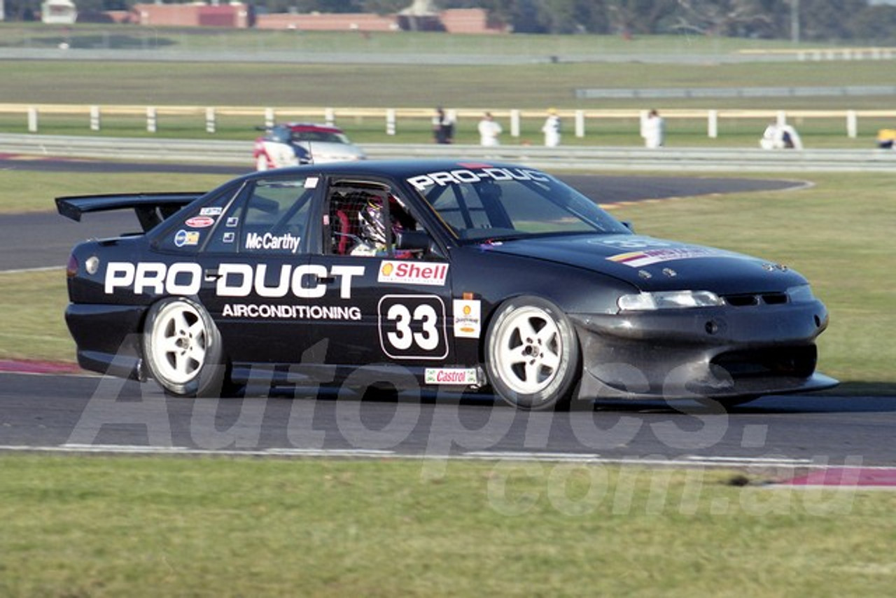 99072 - Allan McCarthy, Holden Commodore VS - Sandown 27th June 1999 - Photographer Marshall Cass