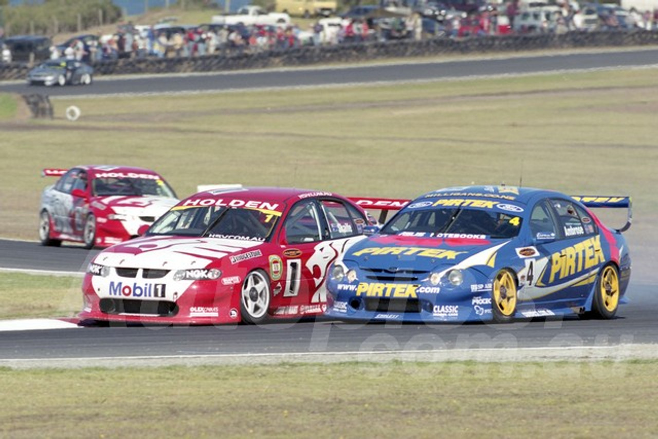 202737 - Mark Skaife, Commodore VX & Marcos Ambrose, Falcon AU - Phillip Island 2002 - Photographer Marshall Cass