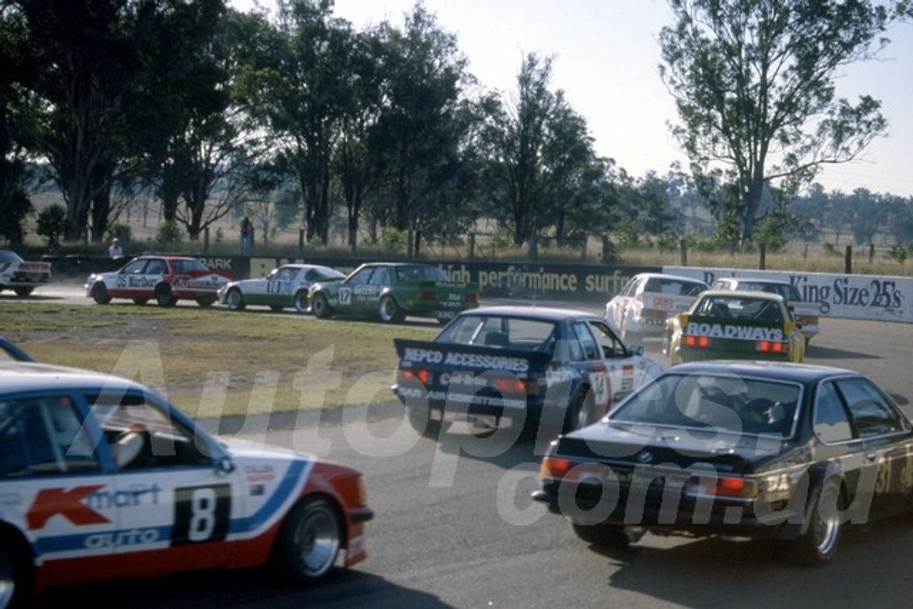84612 - Steve Masterton, Ford XE Falcon Leads on the first lap - 1984 ATCC - Oran Park