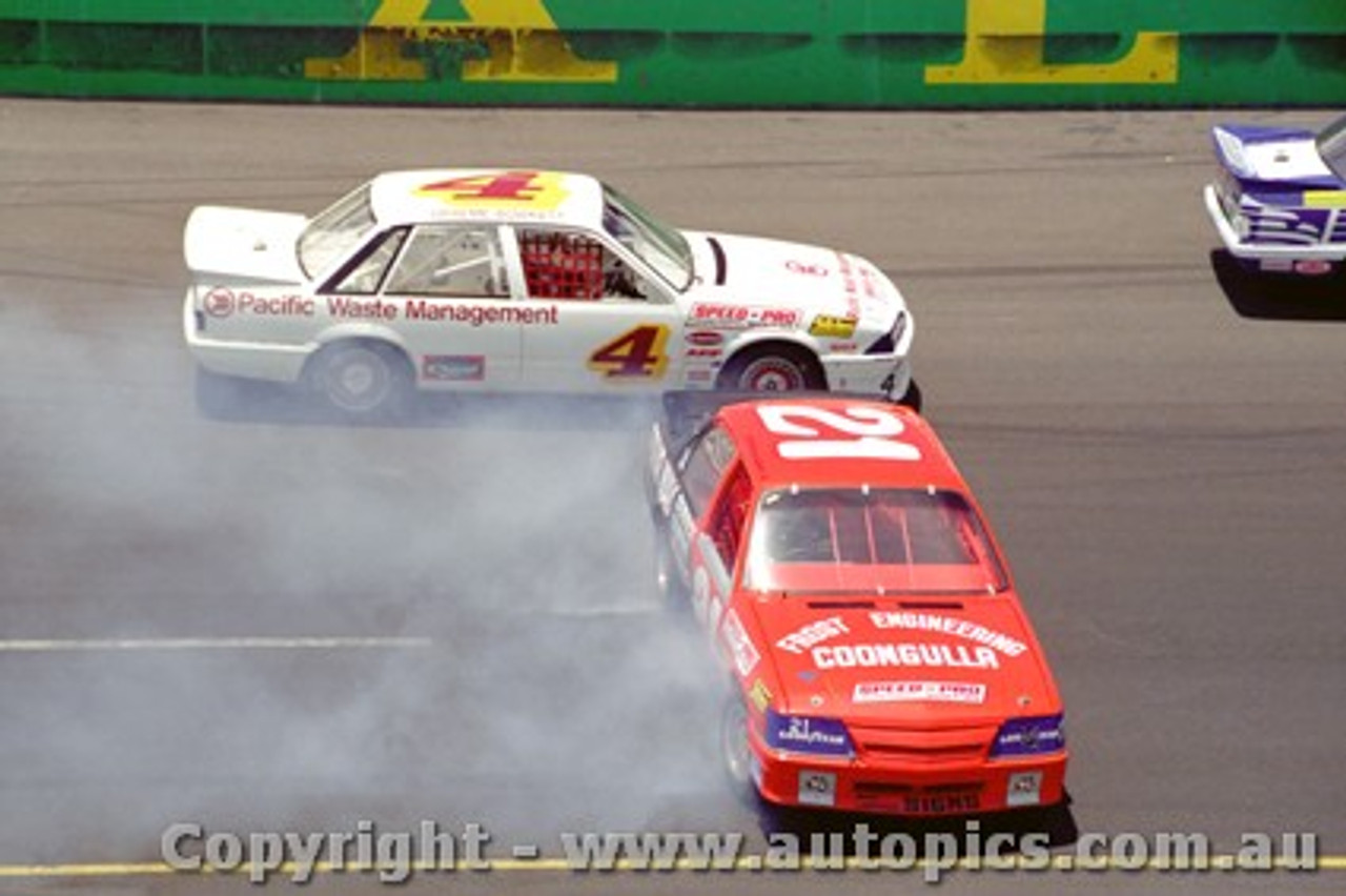 88065 - Graeme Bowkett avoids an out of control  Holden Commodore - The first meeting at the  Calder Park Thunderdome  February 1988 - Photographer Darren House