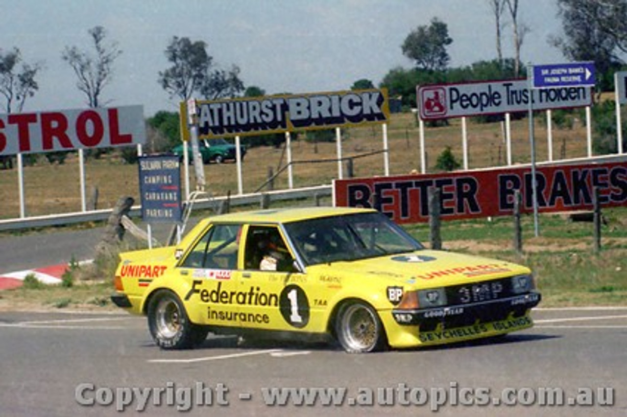 80755 - A. Moffat / J. Fitzpatrick  Ford Falcon XD  with a flat front drivers sie tyre - non finisher -  pisto rings - only completed 3 laps -  Bathurst 1980 - Photographer Lance J Ruting