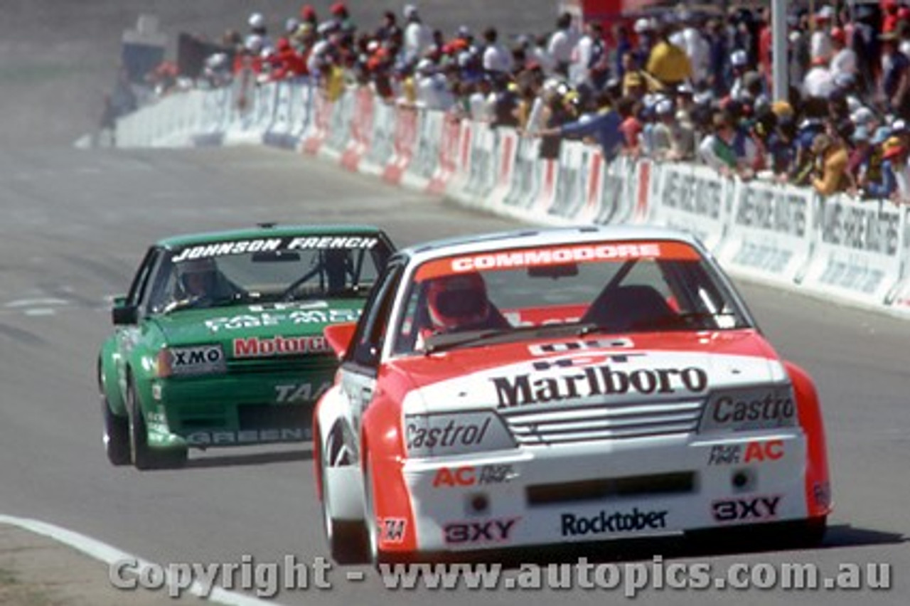 84808  - P. Brock / L. Perkins Holden Commodore VK &  D. Johnson / J. French - Ford Falcon XE - Bathurst 1984 - Photographer Ray Simpson