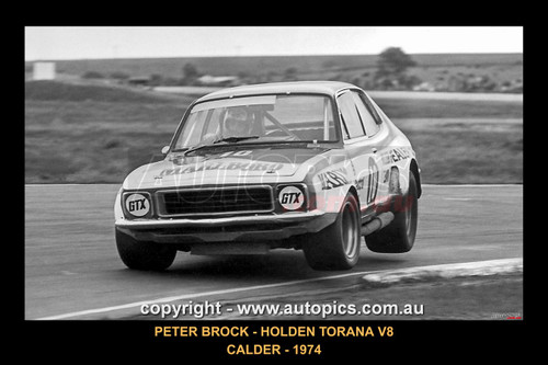 Peter Brock, Holden Torana V8 - Calder Park Raceway, 1974 - Printed with a black border and a caption describing the photo.