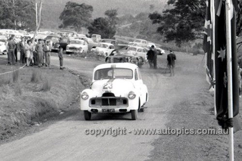60014 -  Jim McKeown, Holden FX & Pete Geoghegan, Jaguar - Phillip Island 1960 - Photographer Peter DAbbs